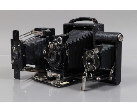 Three Folding Cameras, a 3'' x 4'' folding plate camers, with The Westminster Photographic Exchange LTD Oxford Street London 