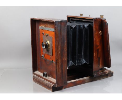 A Mahogany Tailboard Studio Camera, back frame stamped "M Optical Co", possibly Manhattan Optical Co, format 9½ in square app