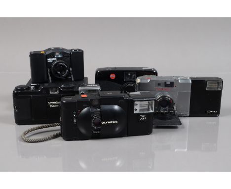 A Group of Compact Cameras, a Leica mini zoom, shutter noisy, flash working, a Contax T, heavy corrosion to body, an Olympus 