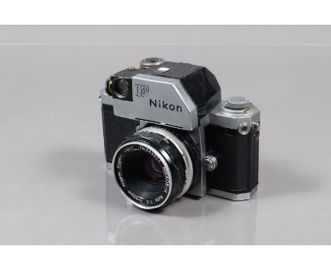 A Nikon F Photomic II SLR Camera, chrome, serial no 648758, shutter working, meter appears unresponsive, self timer working, 