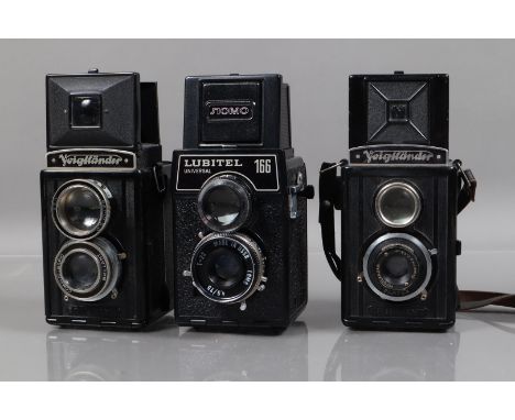 Three Bakelite TLR Cameras, a Voigtländer Brillant V6, shutter jammed, a Voigtländer Focusing Brillant, shutter jammed, bodie