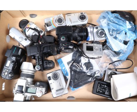 A Tray of Digital Cameras, including a Konica Minota Diamage A2 and A200, a Minolta 7i, a Casio Bestshot, two Kodak Easy Shar