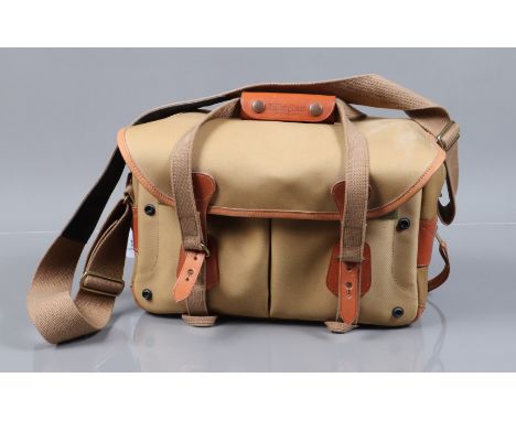 A Billingham Camera Bag, Khaki canvas bag, L 37cm, W 18cm, H 24cm approx, olive green interior, with 815 inserts, two front p