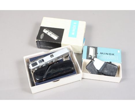 A Minox B Sub-miniature Camera Outfit, for Minox 9.5mm film, body F-G, shutter working, meter reacts to light, with chain, ca