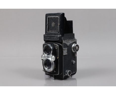 A Yashica 635 TLR Camera, shutter working, body F-G, wear and scratches to edges, with Yashinon 80mm f/3.5 lens, elements G