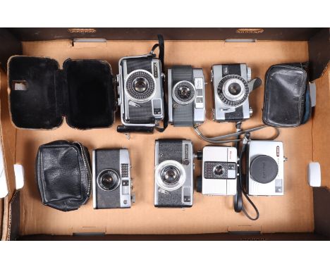 A Group of Half Frame Cameras, a Ricoh Caddy, shutter working, meter responsive, a Ricoh EE, shutter working, a Rocoh Auto Ha