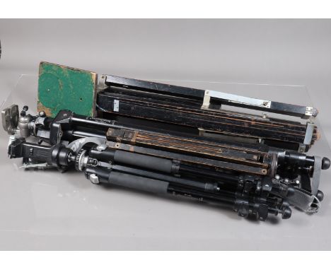 A Group of Studio Tripods, comprising a wooden tripod stand with large platform, possibly for a Gandolfi or other large forma