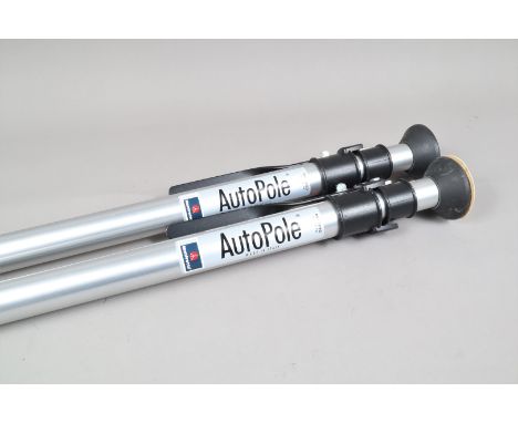 Two Manfrotto Autopoles, extend from 149cm to 270cm, both move freely, some light signs of use, G