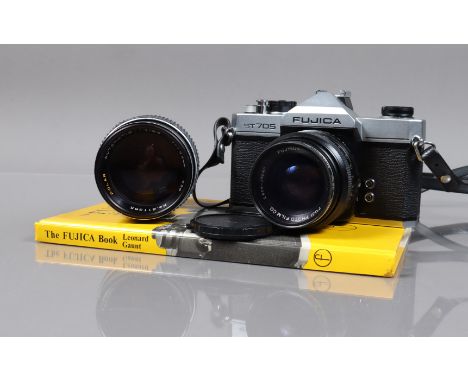 A Fujica ST 705 SLR Camera Outfit, shutter working, meter responsive, body G, light wear, with Fujinon 55mm f/1.6 lens, Polar