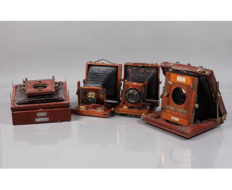 Two Quarter Plate Mahogany and Brass Field Cameras, comprising a Houghton Victo, a brass lens with wheel stops, a Lizars Chal