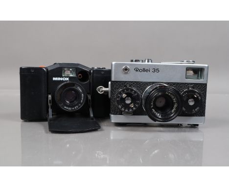 Two Compact Cameras, a Rollei 35, shutter working, film advance lever slipping, meter responsive, body G, elements G, with ha