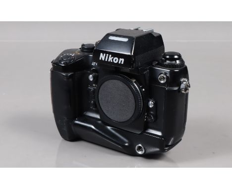 A Nikon F4 SLR Camera Body, serial no 24194491, shutter working, meter responsive, appears to function as should, body G, som