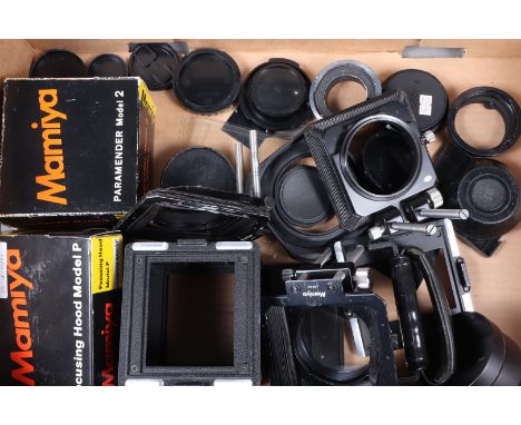 A Tray of Mamiya Accessories, including a Focusing Hood Model P, a Paramender Model 2, both in maker's boxes, three bellows l