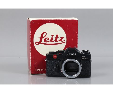 A Black Leitz Portugal Leica R3 SLR Body, serial no 1490799, 1978, body G, shutter working, meter reacts to light, with Leitz