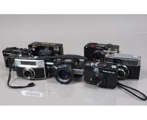 A Group of Compact Cameras, including a Rollei 35 LED, missing battery cover, a Yashica Electro 35MC, a Yashica MF-3, an Agfa