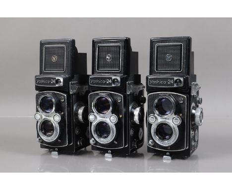 Three Yashica 24 TLR Cameras, one with working shutter, others with crank/shutter issues, all meters responsive, bodies G-VG,