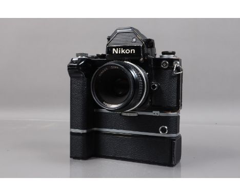 A Nikon F2 SLR Camera, black, serial no 7561846, shutter working, self timer working, with DP-2 finder, meter responsive, bod