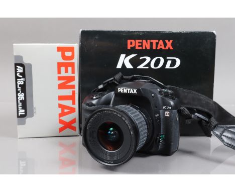 A Pentax K20 D DSLR Camera, serial no 2896670, powers up, shutter working, appears to function as should, with four batteries