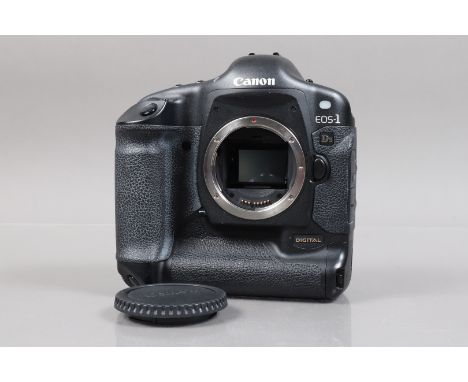 A Canon EOS-1 DS DSLR Camera Body, serial no 107008, body G, light wear, shutter fires, displays light, camera otherwise unte