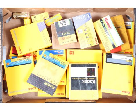 A Tray of Expired Large Format Cut Films, comprising 7 boxes of 4 x 5in Kodak Professional Tri-X Pan, 3 boxes of 4¾ x 6½in Pr