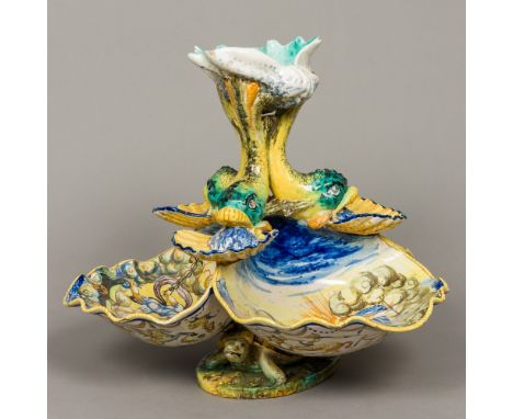 A late 19th/early 20th century Cantagalli majolica centrepieceThe central shell supported on stylised dolphins issuing water 