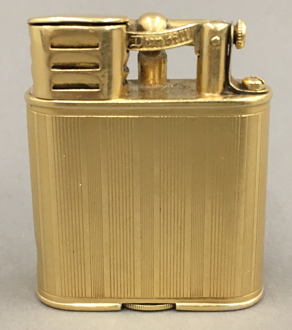 A Dunhill 18 ct gold plated lighter, signed Alfred Dunhill, Paris and