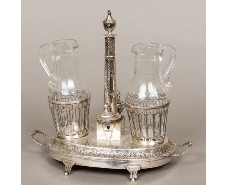 An 18th century French silver cruet stand, hallmarked Paris 1787, maker's mark of Claude Francois VonarmsThe engraved domed b