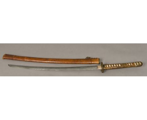 A World War II Japanese officer's katana swordOf typical form, with wrapped shagreen handle covering the signed tang, housed 