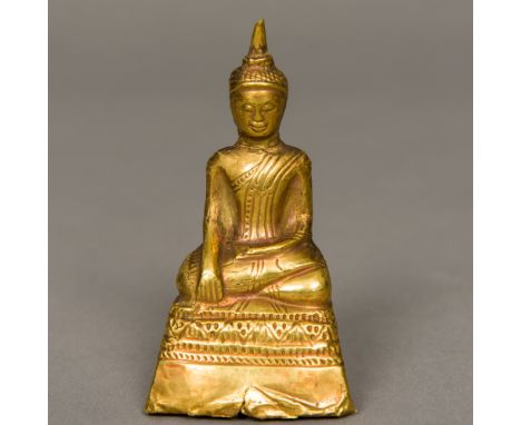A Sino-Tibetan small antique unmarked high carat gold clad BuddhaTypically modelled seated in the lotus position.  8.5 cm hig