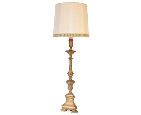 A large 19th century French brass floor standing standard lamp in the form of a Church candlestick. Heavy brass construction 