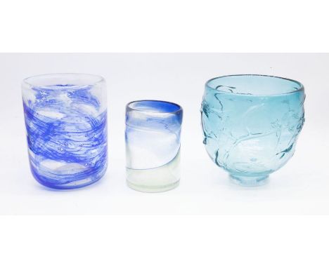 A small collection of glass to include; A Michael Harris Isle of Wight glass circular vase with swirl like blues and whites t