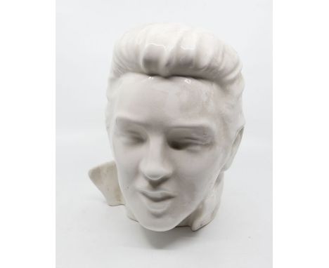 A moulded ceramic bust of Elvis in plain white colourway, unmarked possibly a trial piece. Approx. 27cm high x 20.5cm wide.Fu