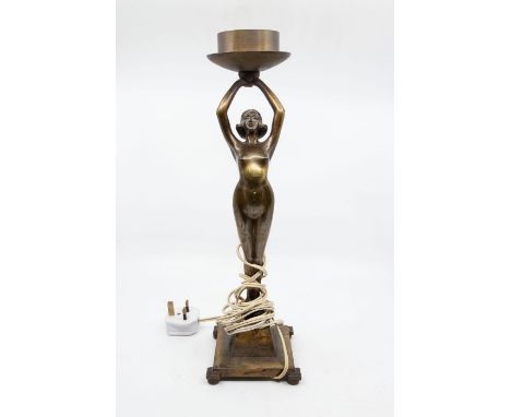 A Banksway Art Deco bronzed metal figurine of nude displaying lamp fittings, on square Deco base.Approx. 42cm high x 12cm wid