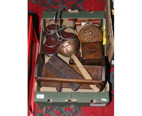 A box of wooden items to include carved Buddha, egg timer, money box etc.
