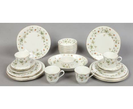 A Royal Doulton part dinner and tea service decorated in the strawberry cream design, 26 pieces.