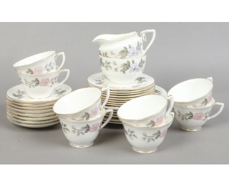 A Royal Worcester tea service decorated in the June Garland design 32 pieces.