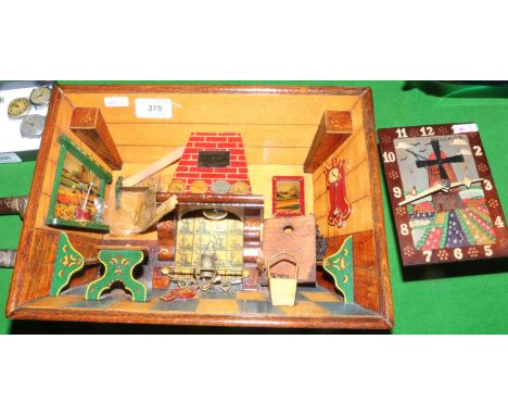 A 1950s Dutch wall hanging interior scene, along with a similar wall hanging clock.