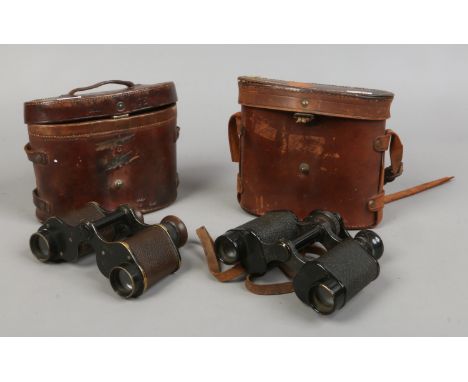 A cased set of Ross binocular Prismatic Mark III with broad arrow marks, binoculars and case monogrammed R.H.G, along with ca