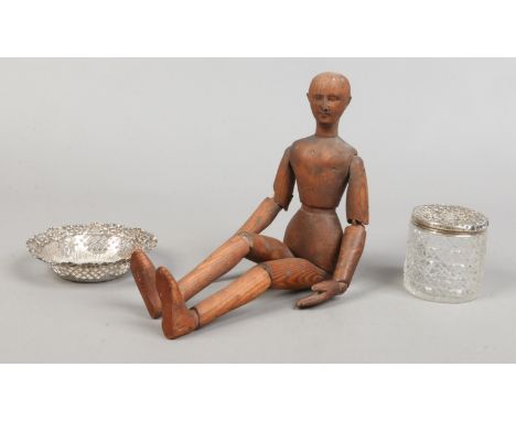 A Victorian silver pierced dish, along with a silver topped jar and a vintage wooden jointed mannequin.