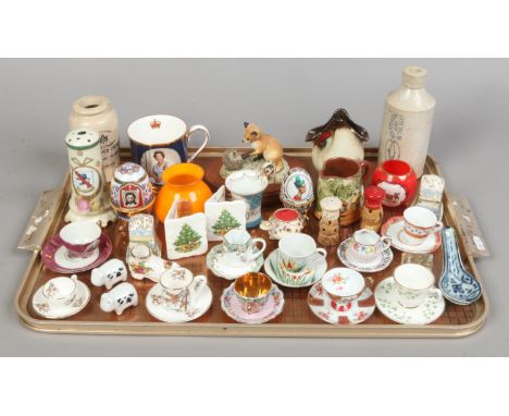 A tray of mixed ceramics to include miniature bone chain cup and saucers, crested ware, West German pottery etc.