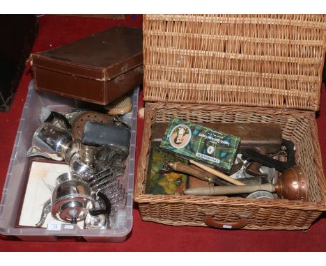 A basket and a box of mixed metalwares, silver plate, copper posser, block plains etc and a vintage suitcase.