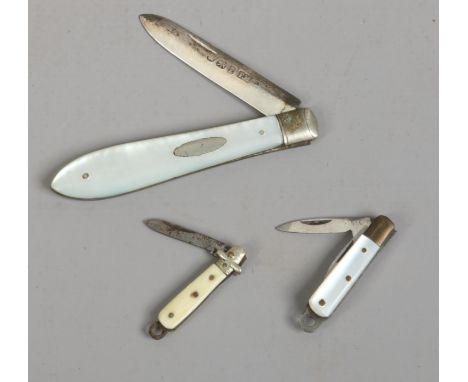 A Thomas Marples mother of pearl handled fruit knife with silver blade, along with two miniature pen knives, one with mother 