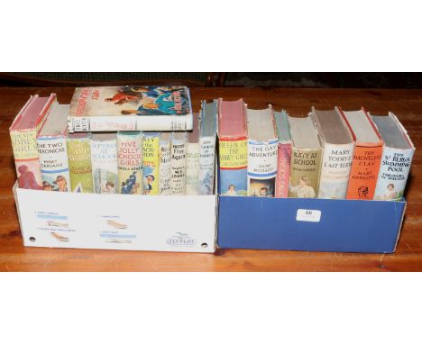 A collection of vintage hardback children's books.