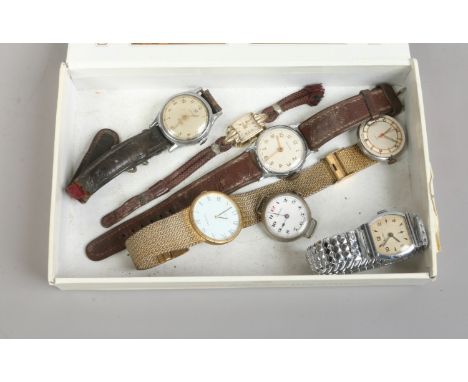 An assortment of manual and quartz ladies and gents wristwatches.