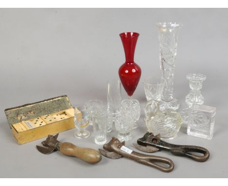 A collection of cut glassware's to include vase, shot glasses etc, along with three vintage tin openers formed as cows heads 