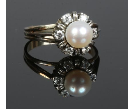 A mid 20th century 18ct gold pearl and diamond ring of floriform, probably French size P.