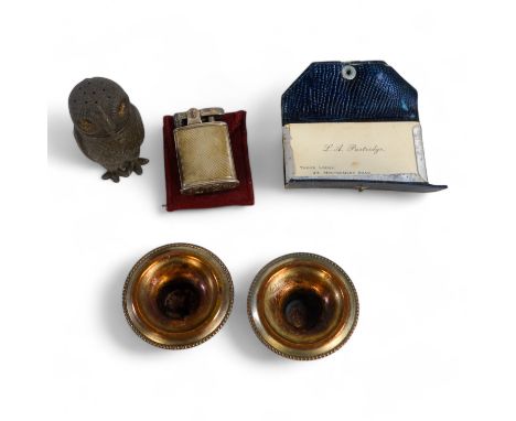 A silver cased Ronson lighter - inscribed 'Art Metalworks Newark NJ USA' and 'U.S. RE PAT 19023' to base, with engine turned 