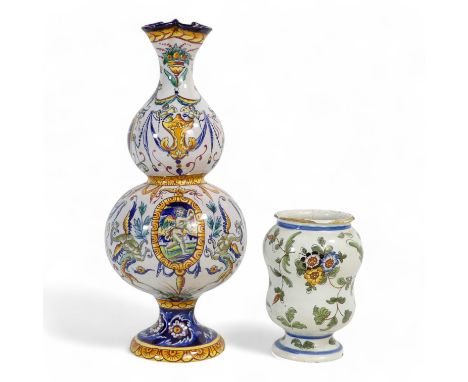 A pair of Quimper pottery double gourd vases - with typical decoration, 33cm high, together with another faience vase. (3)