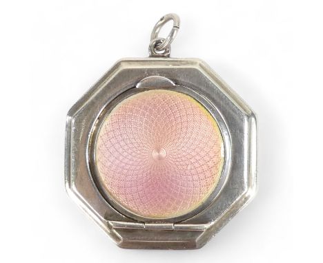 A small silver compact with pink enamel lid and suspension loop - marks rubbed, 4.3 x 4.3cm.