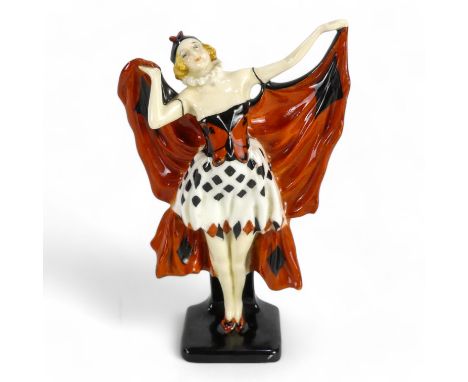 A Royal Doulton 'Butterfly' figure, 'HN720' - modelled as a lady wearing a butterfly bodice and white diamond skirt, holding 